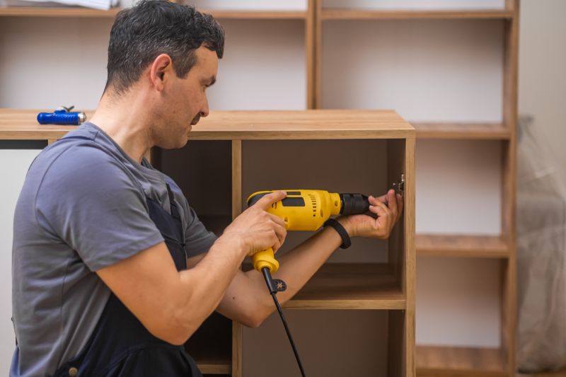 Handyman Installing Shelves